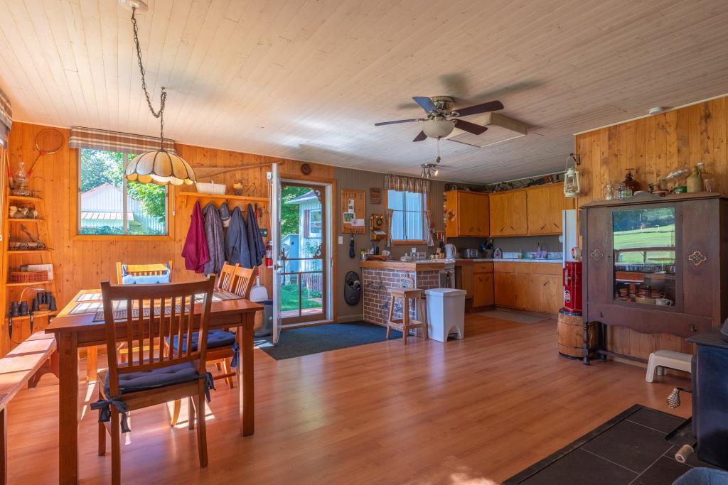 Warm weather awaits at this small riverside retreat for $149,000