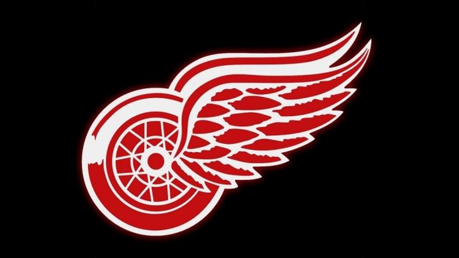 Wings sign prospect after acquiring him in trade.