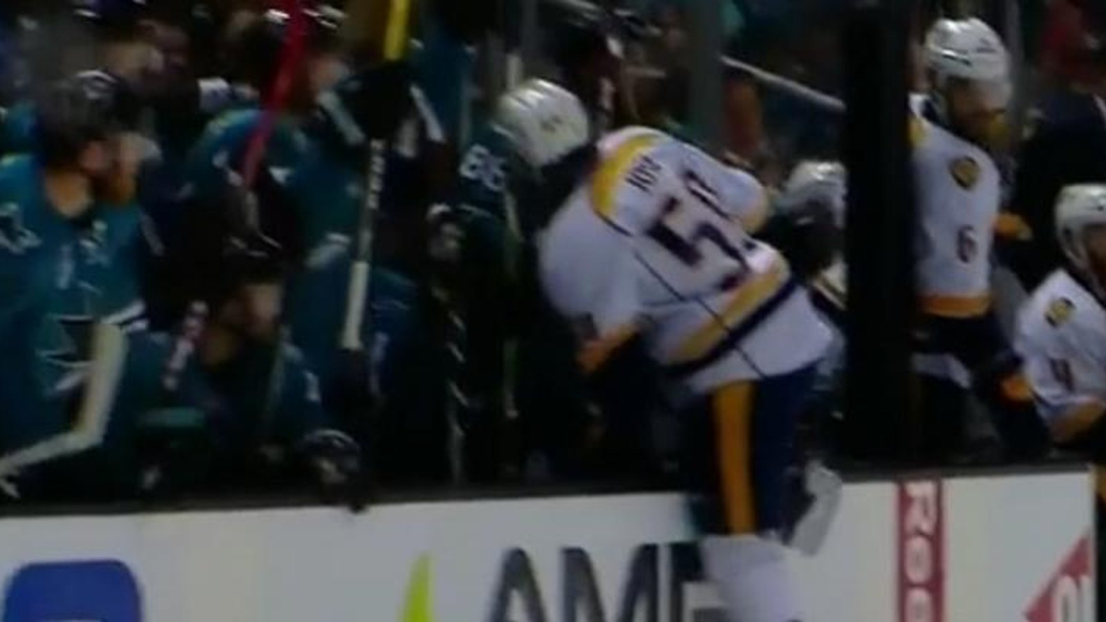 Roman Josi tries to jump on the wrong bench to avoid a penalty.