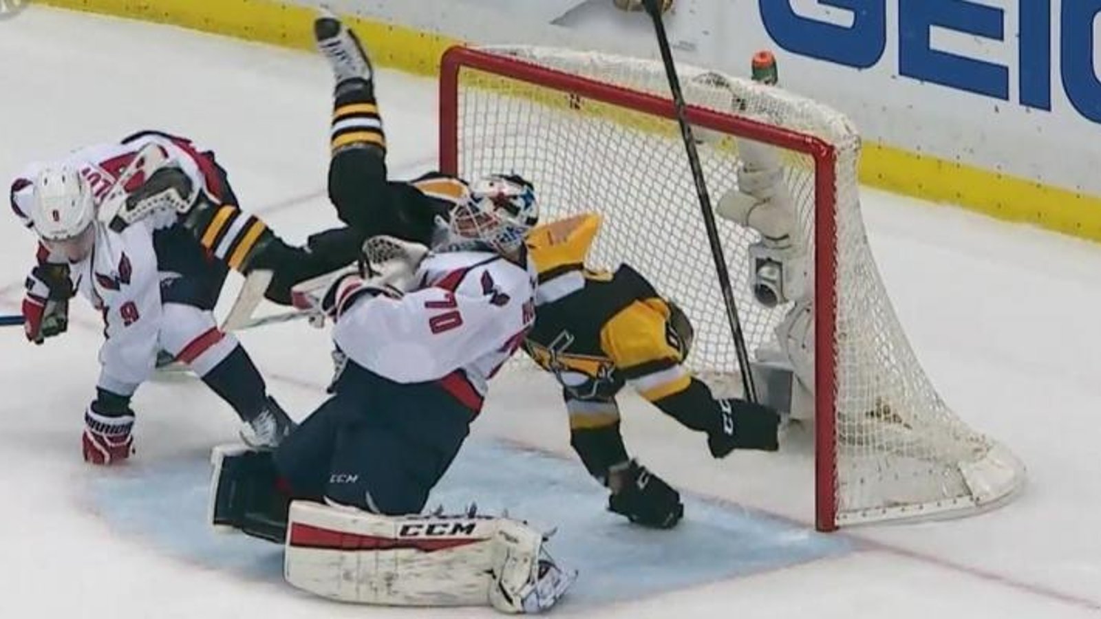 Hit on Hagelin sends him flying into Braden Holtby.