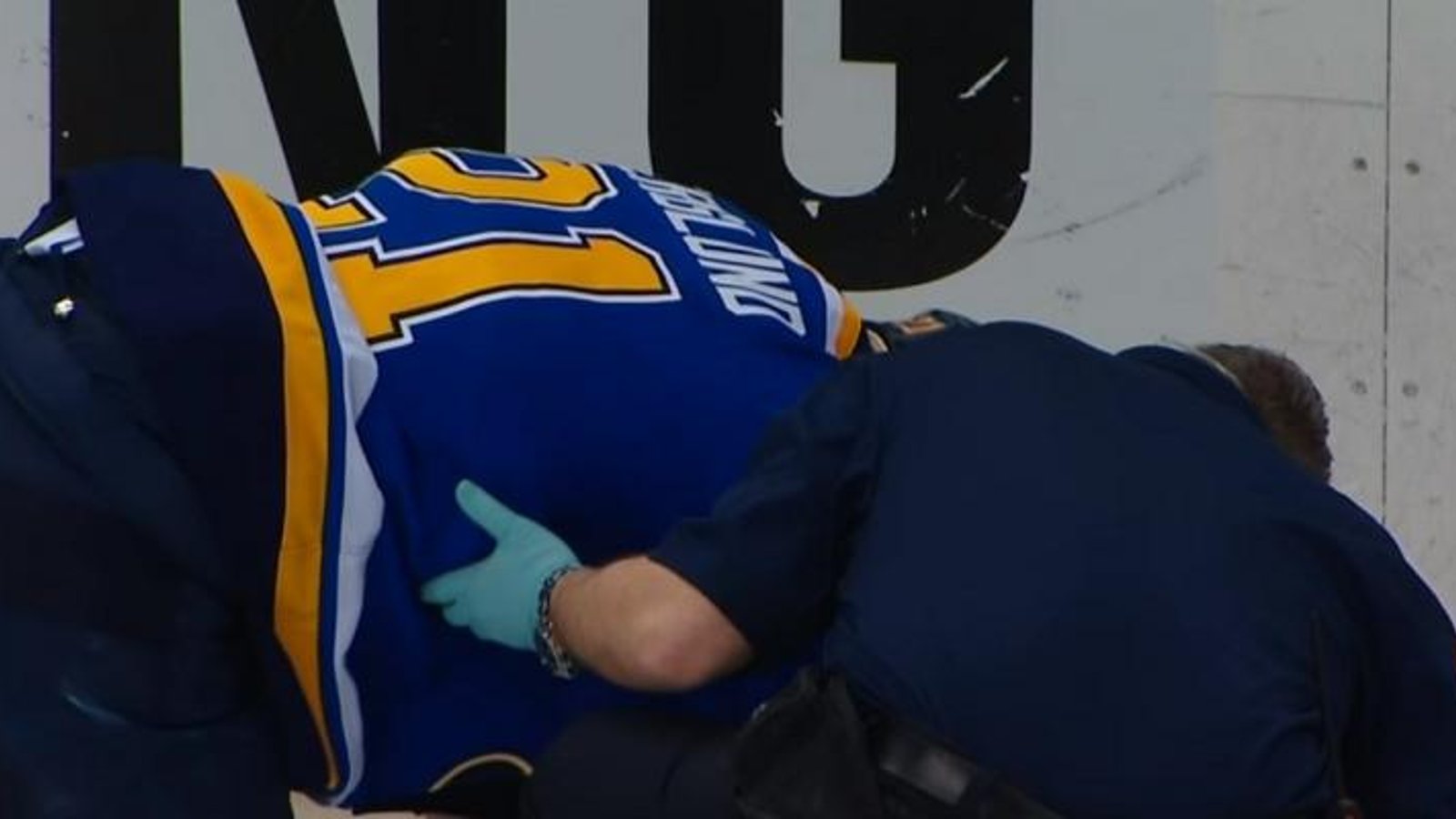 Berglund goes down after hit results in collision with open bench door.