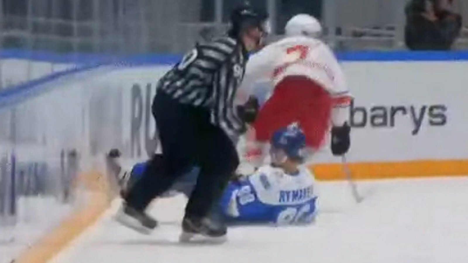 What the hell? KHL linesman delivers a nasty hit to unsuspecting player.