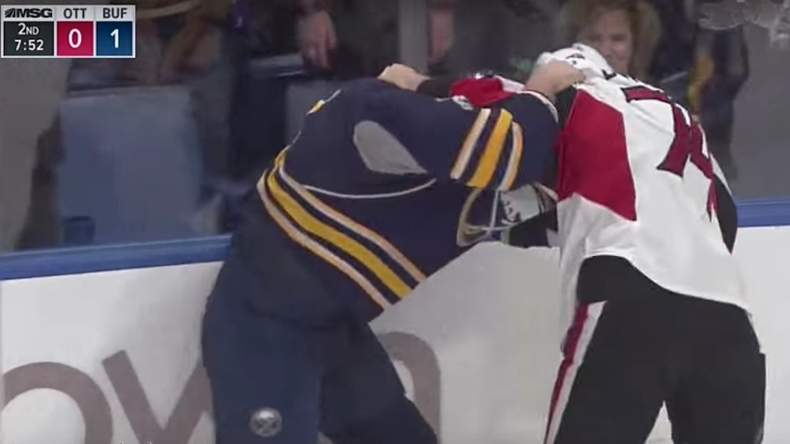 Sabres' Foligno and Sens' Borowiecki throw down in big time fight.