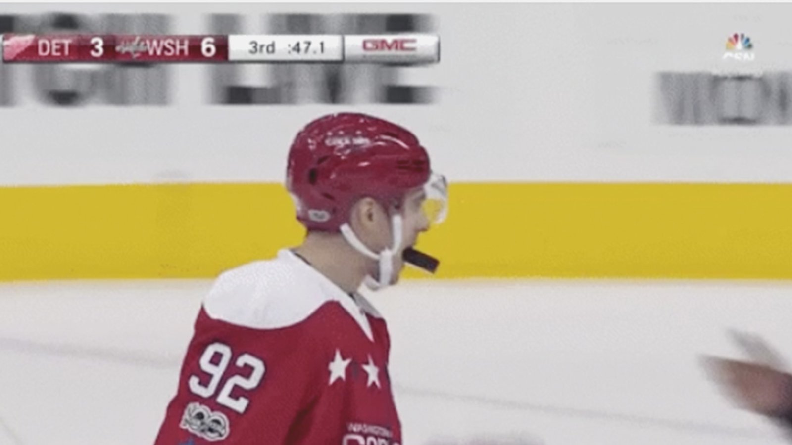 Must see : Evgeny Kuznetsov giving the puck to the ref with his mouth.