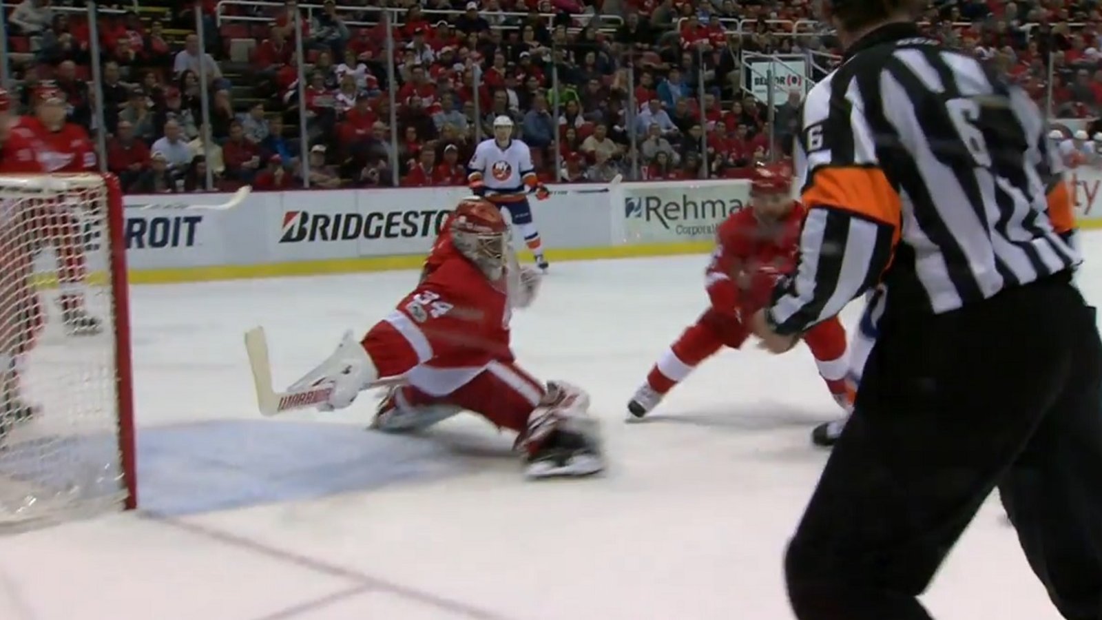 Must see: Mrazek reaches back to rob Tavares with an unbelievable paddle save.