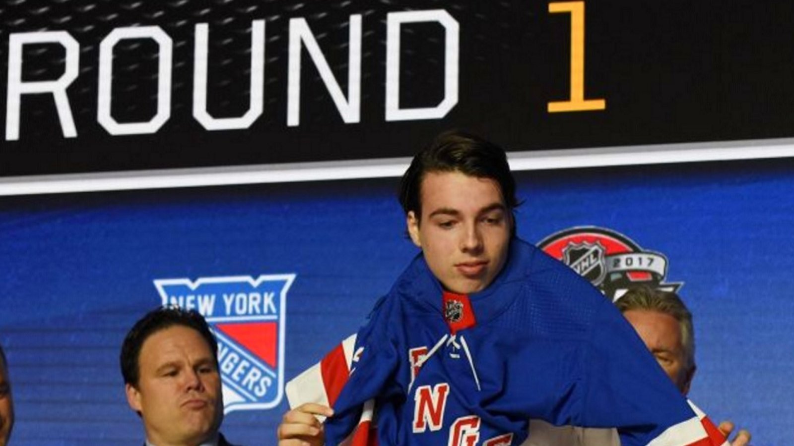 Rangers sign first round pick to his  first NHL deal.