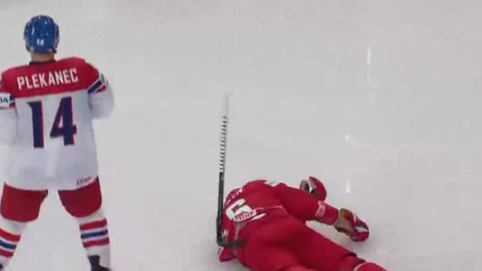 Former NHLer gets crushed by a huge hit at the IIHF World Championship!