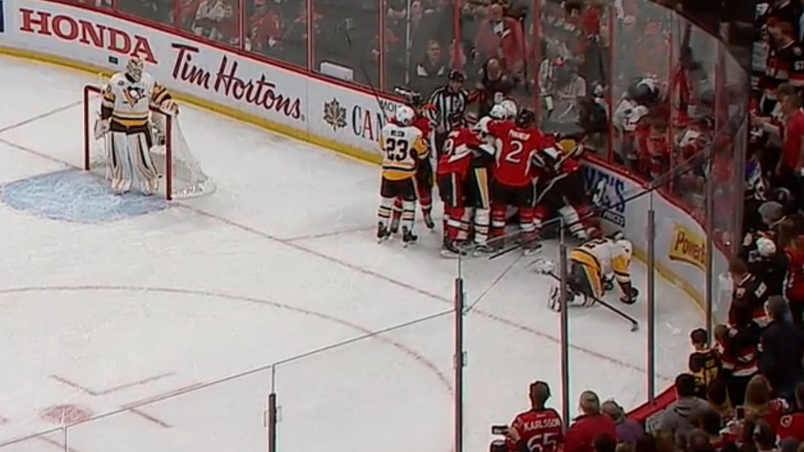 Bobby Ryan destroys Penguins defenseman moments after refs fail to call a penalty. 