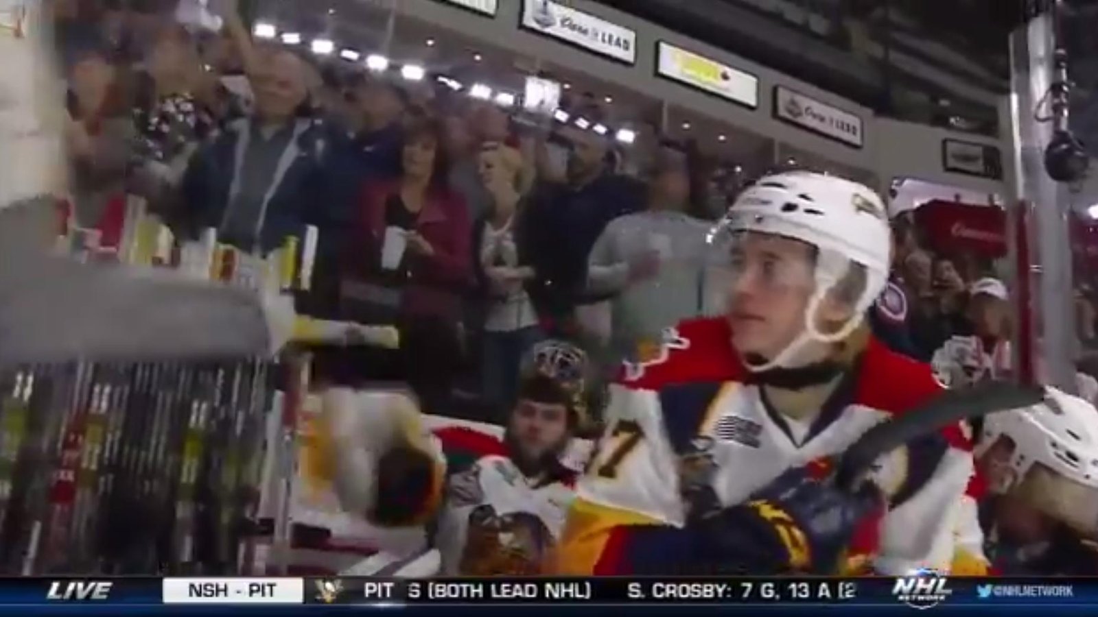 MUST SEE : Pissed goalie throws stick at cameraman! 