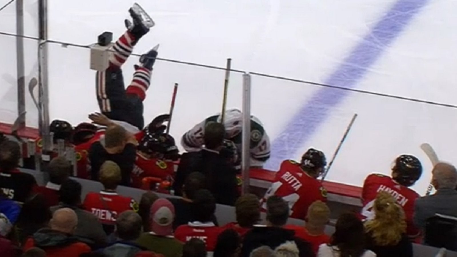 Brent Seabrook gets sent head first into the Blackhawks' bench.