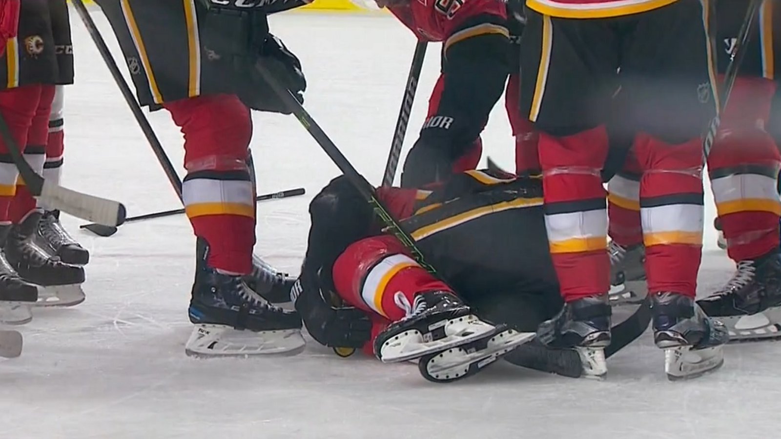 Breaking: NHL veteran goes down with a knee injury, then takes a slap shot to the head.