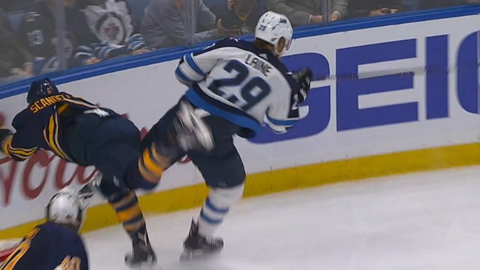 Huge hit from Laine sends player to the locker room. 