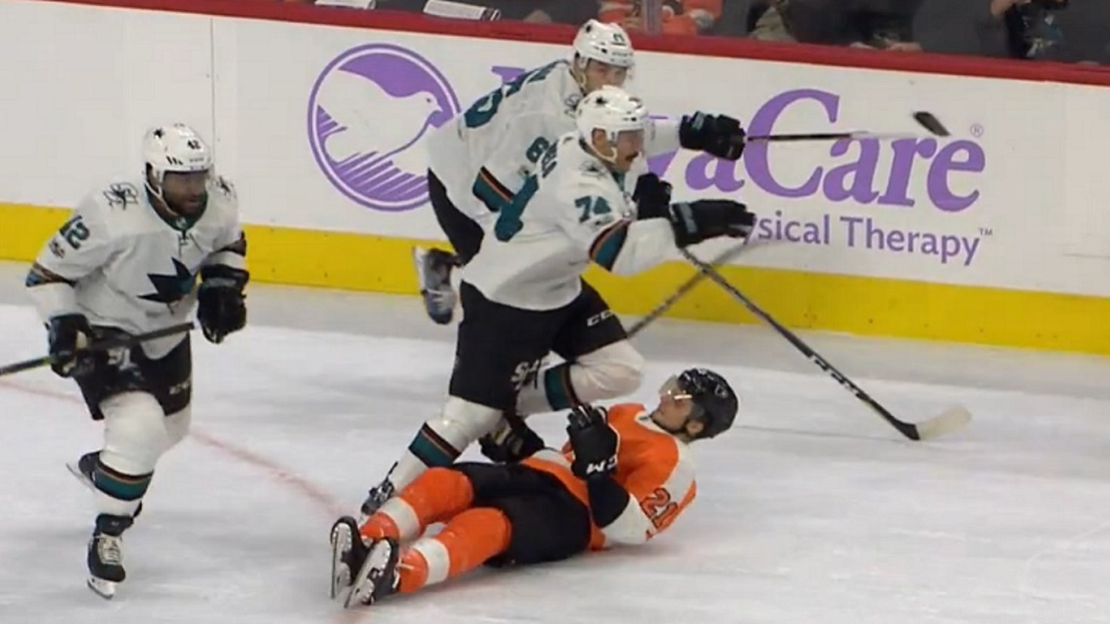 Laughton injured after taking a questionable hit and a knee to the head.