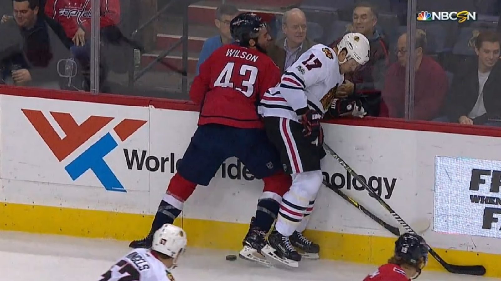 Breaking: Tough guy Tom Wilson injured after big hit along the boards.
