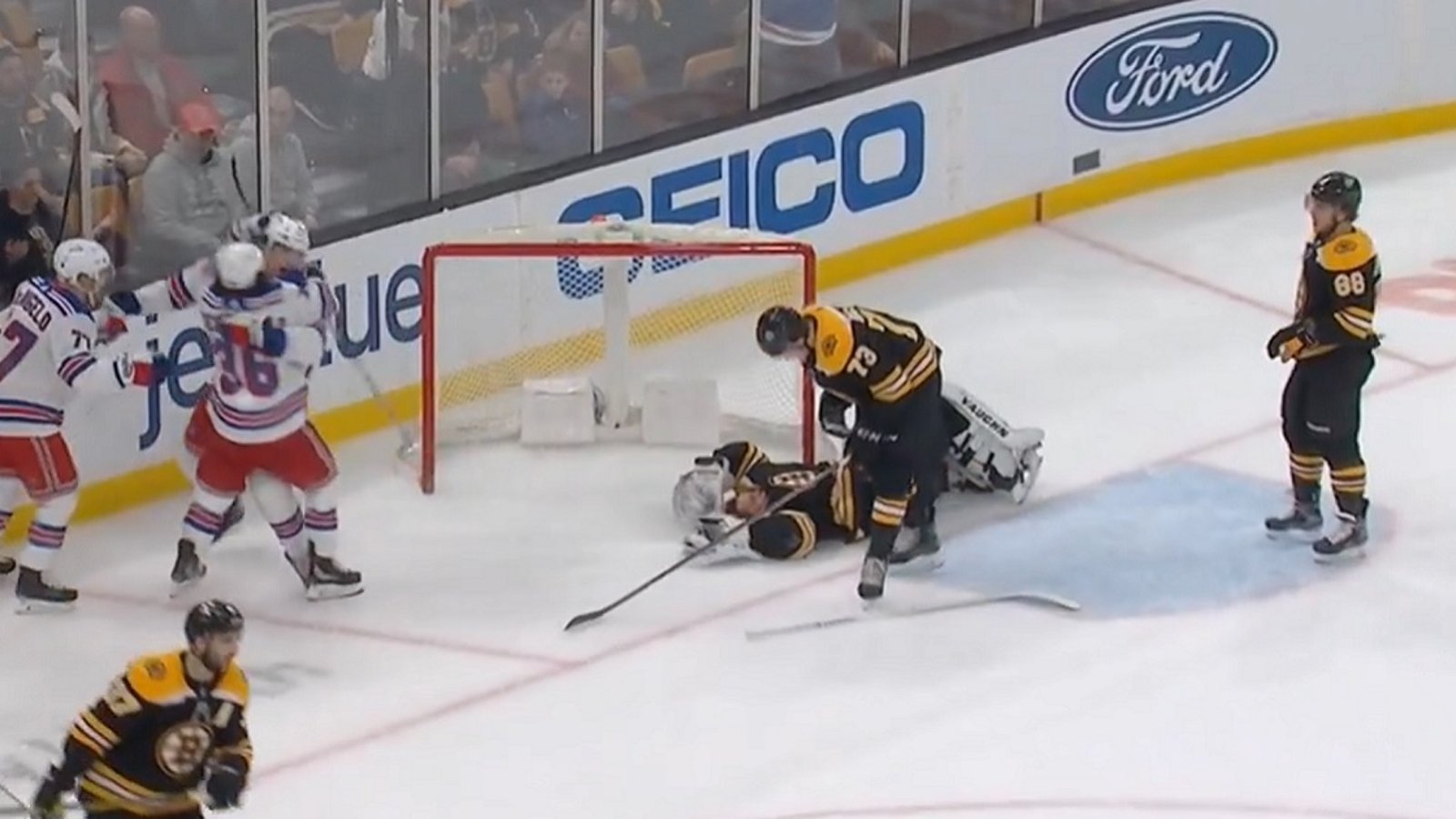 Tuukka Rask hurt after getting bulldozed into his own net.