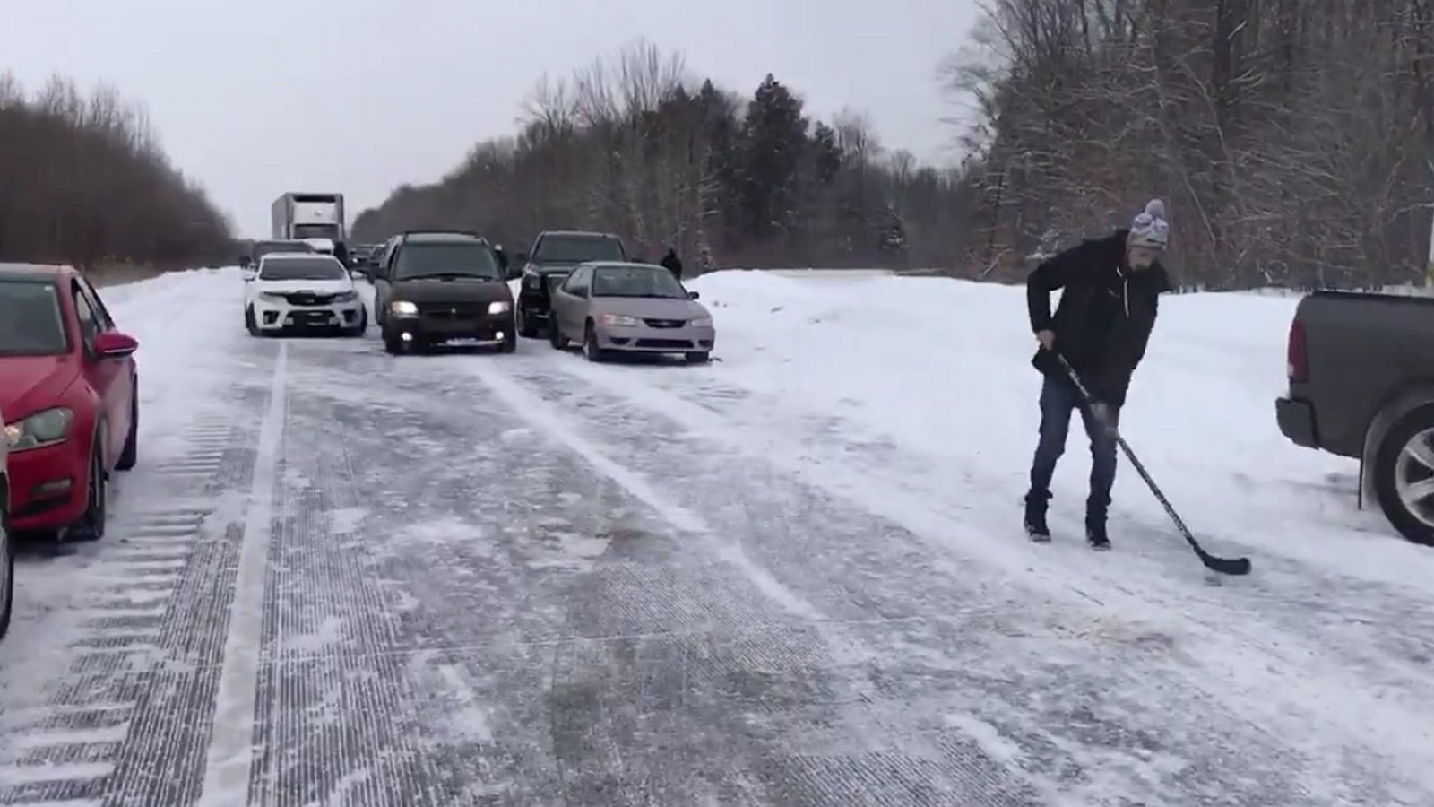 Hockey fans react to major 75 car accident in the most Canadian way ever!