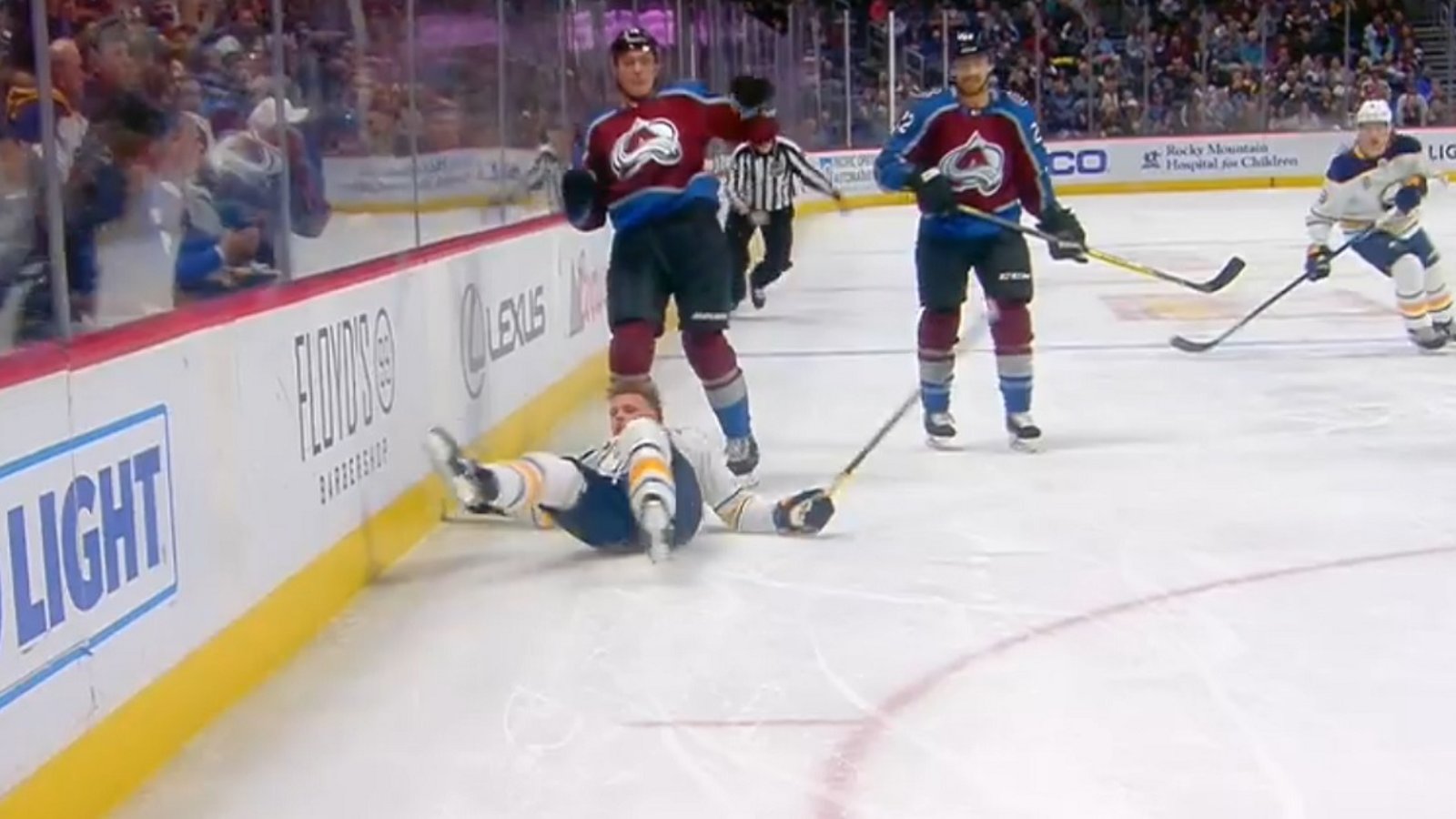 Zadorov levels Jack Eichel after the whistle has blown.