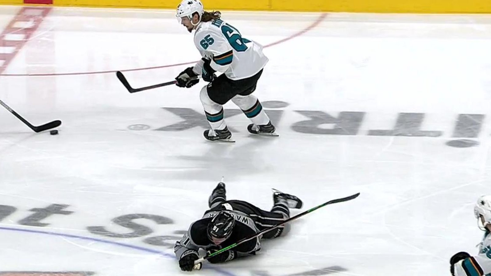 Erik Karlsson sends rookie to the locker room with an ugly head shot.