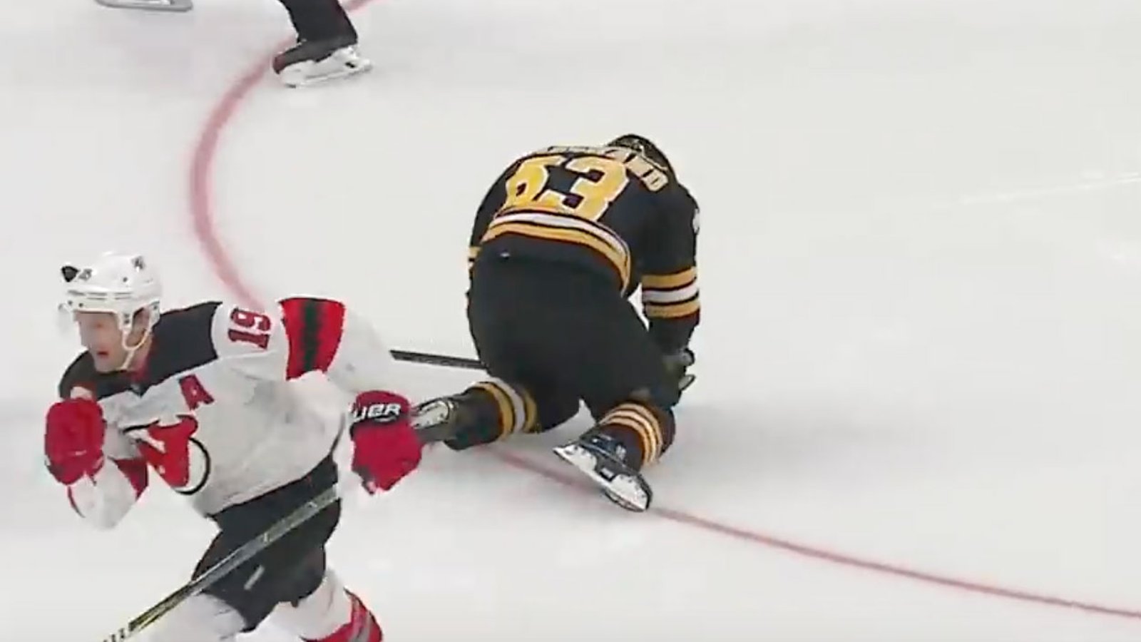 Marchand leaves game woozy with head injury; refs ignore the penalty! 