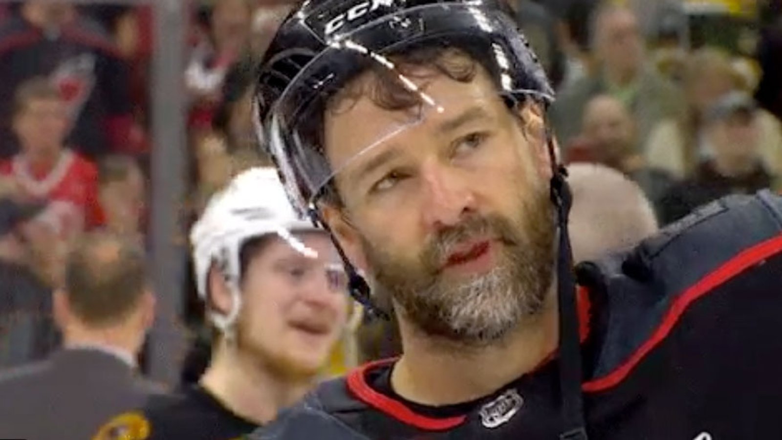 An emotional Justin Williams comforts his crying kids once off the ice