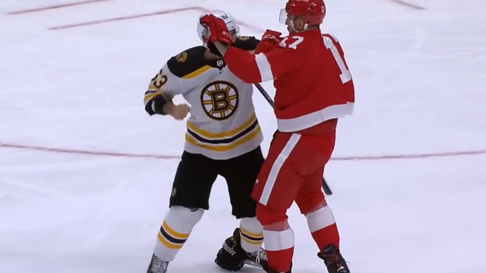 Brad Marchand has enough of Filip Hronek and drops the gloves!