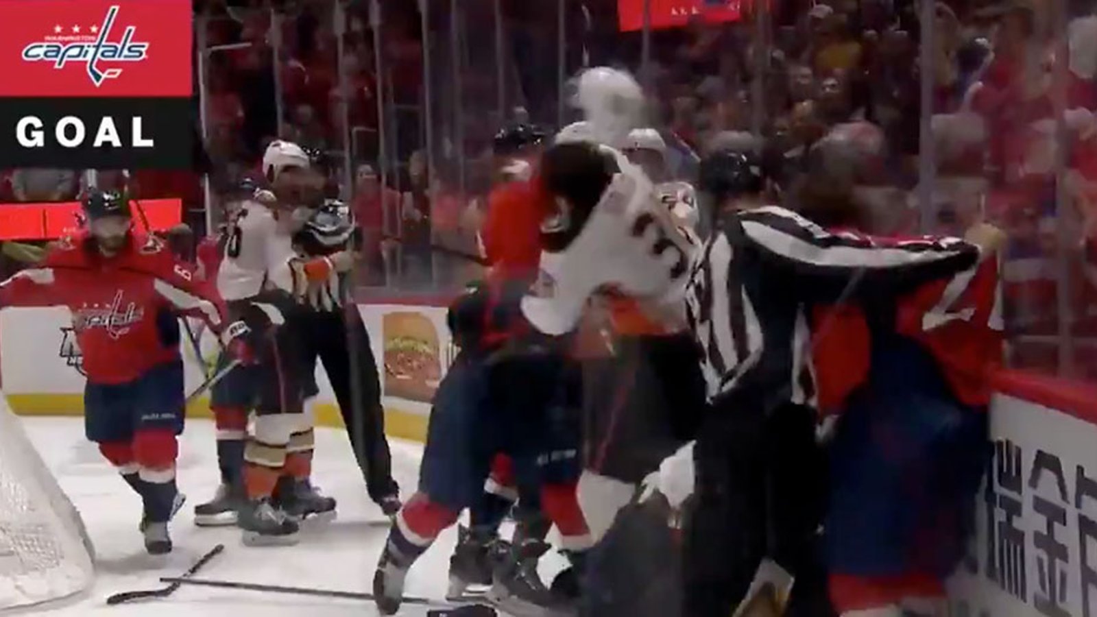 Caps score as an all-out brawl breaks out behind Ducks goal