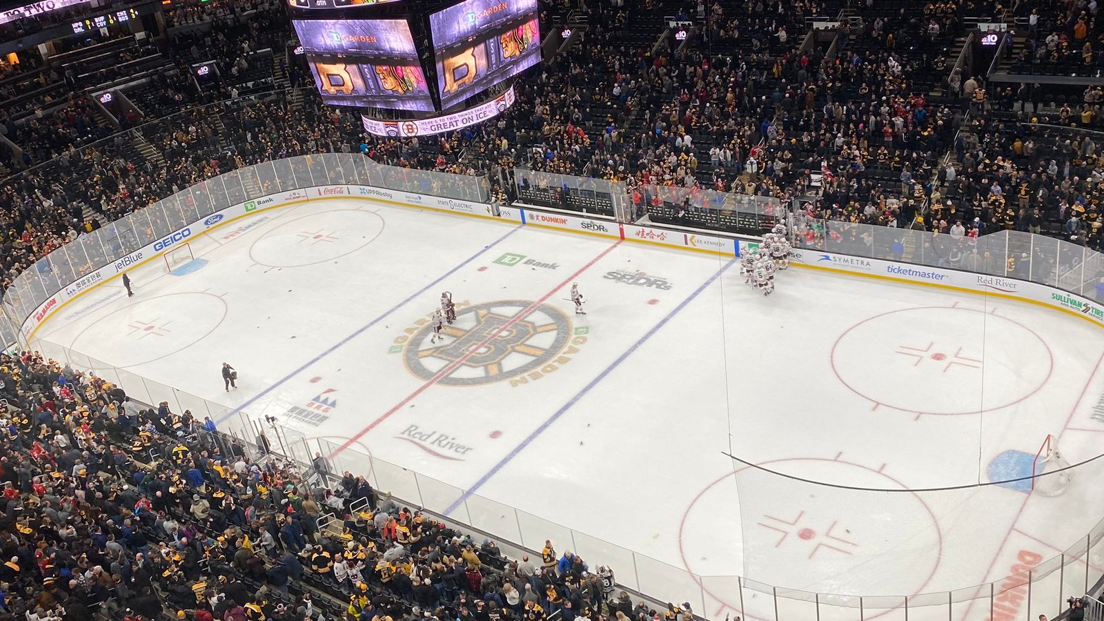 Trash-throwing Bruins fans take flak on social media