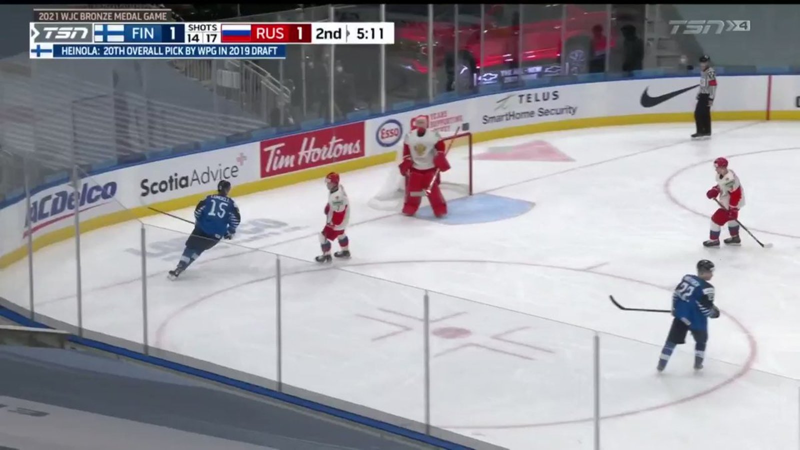 Referee Kyle Kowalski caught coaching Team Finland player on the ice! 
