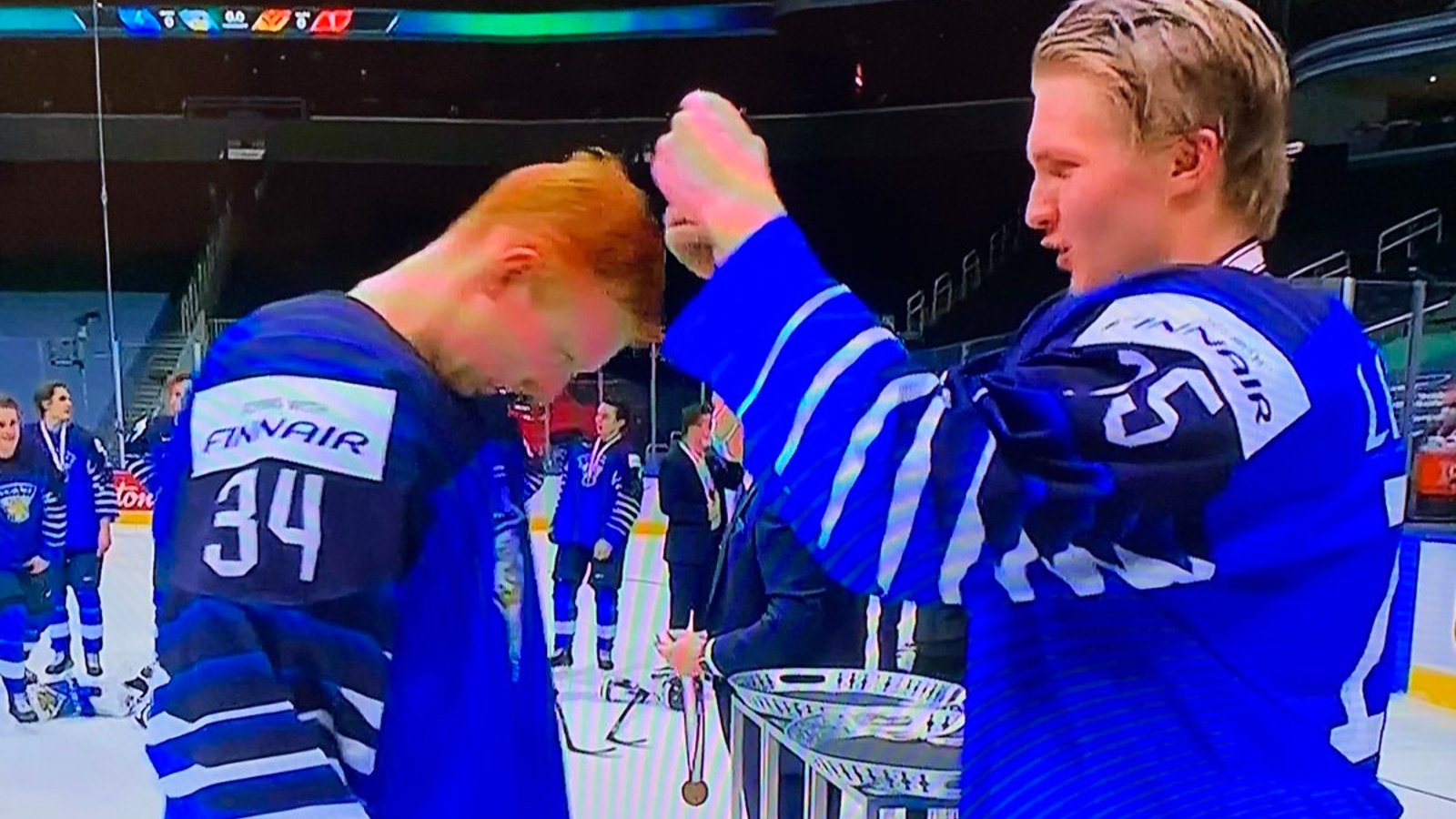 Team Finland forced to receive bronze medal in new touching yet awkward setting 