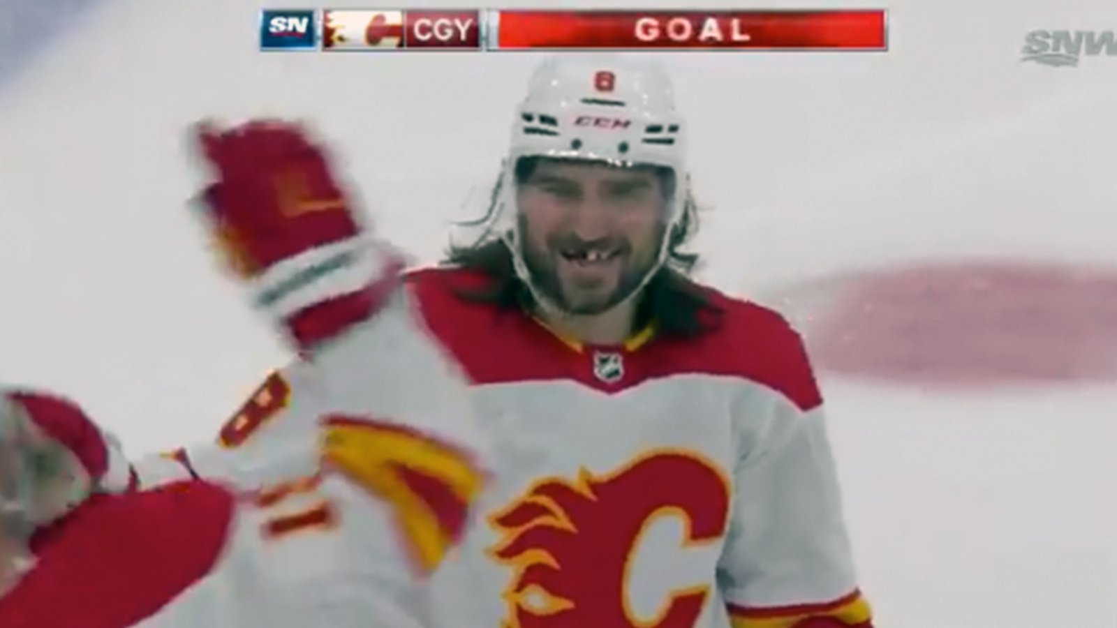 Chris Tanev scores his first goal with the Flames... from his own blueline