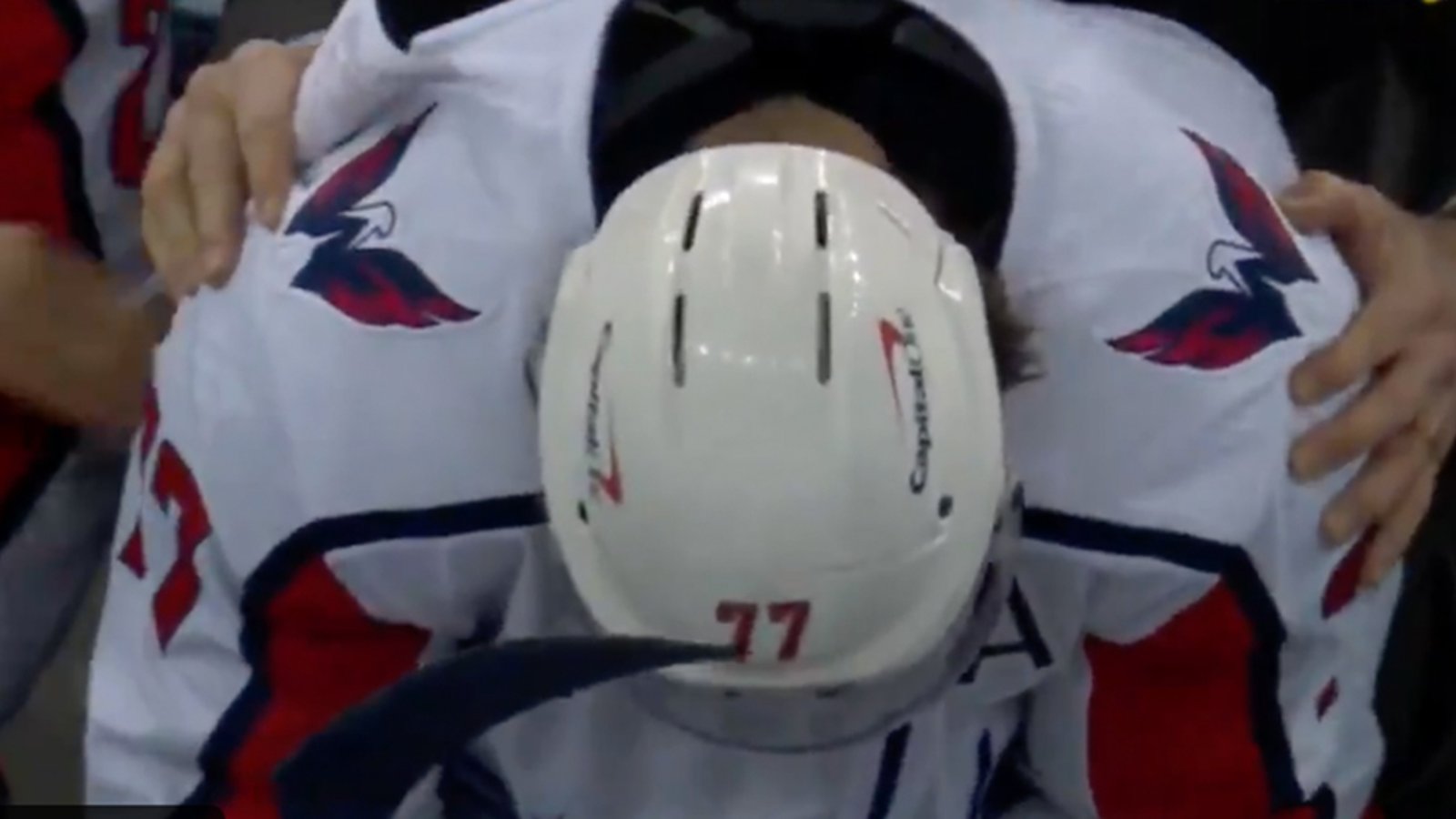 T.J. Oshie wipes away tears after scoring a hat-trick in his first game after his father's death