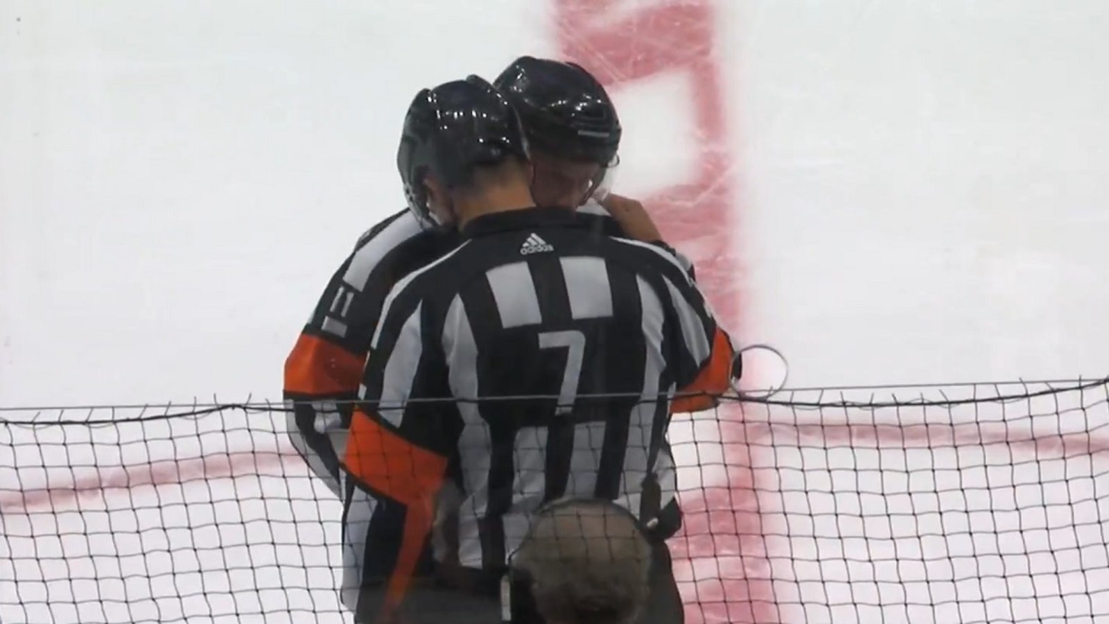 Lightning in disbelief after two questionable calls from NHL officials to end the period.