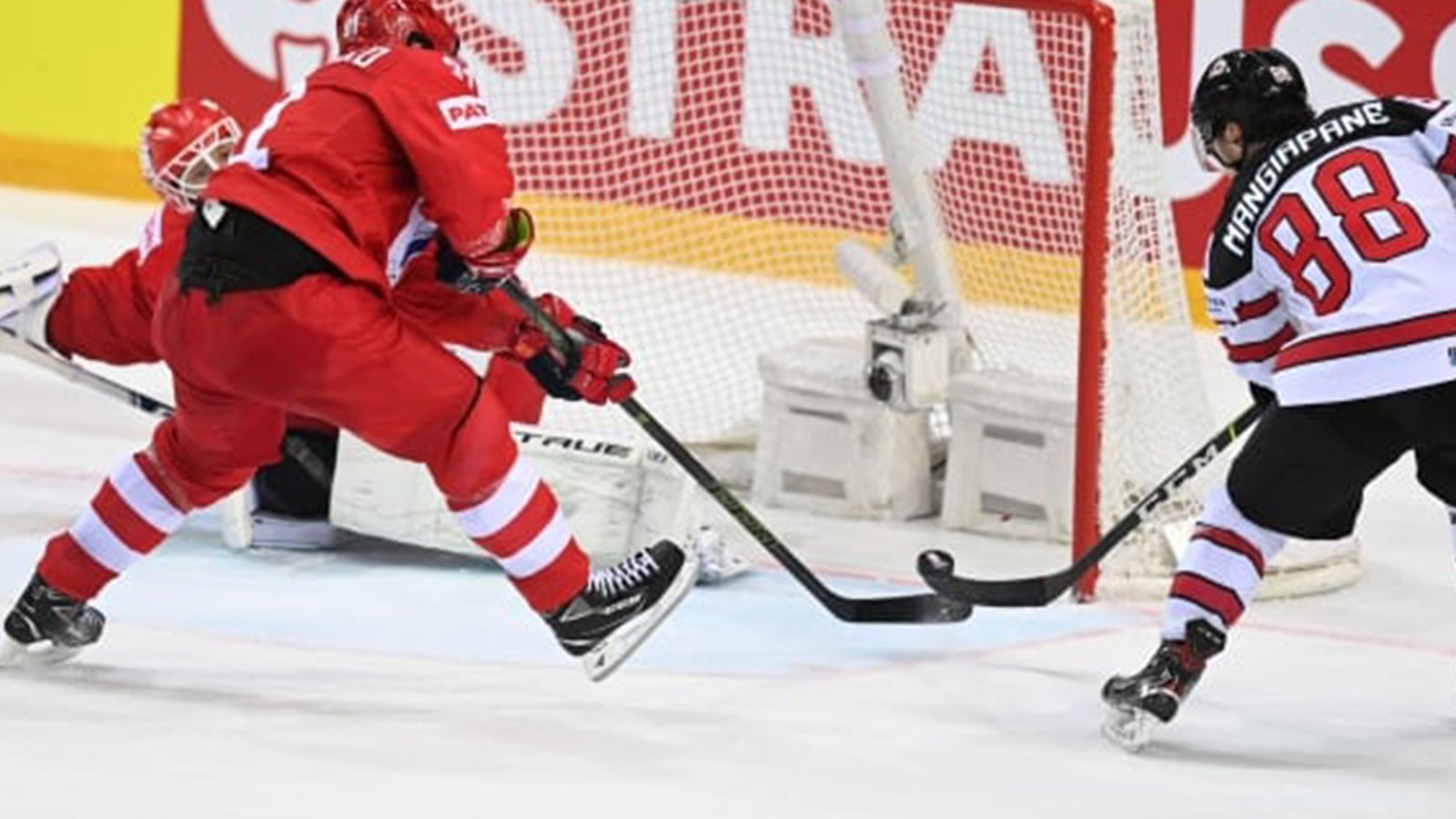 Team Canada wins an OT thriller over Russia to advance in the IIHF World Championship