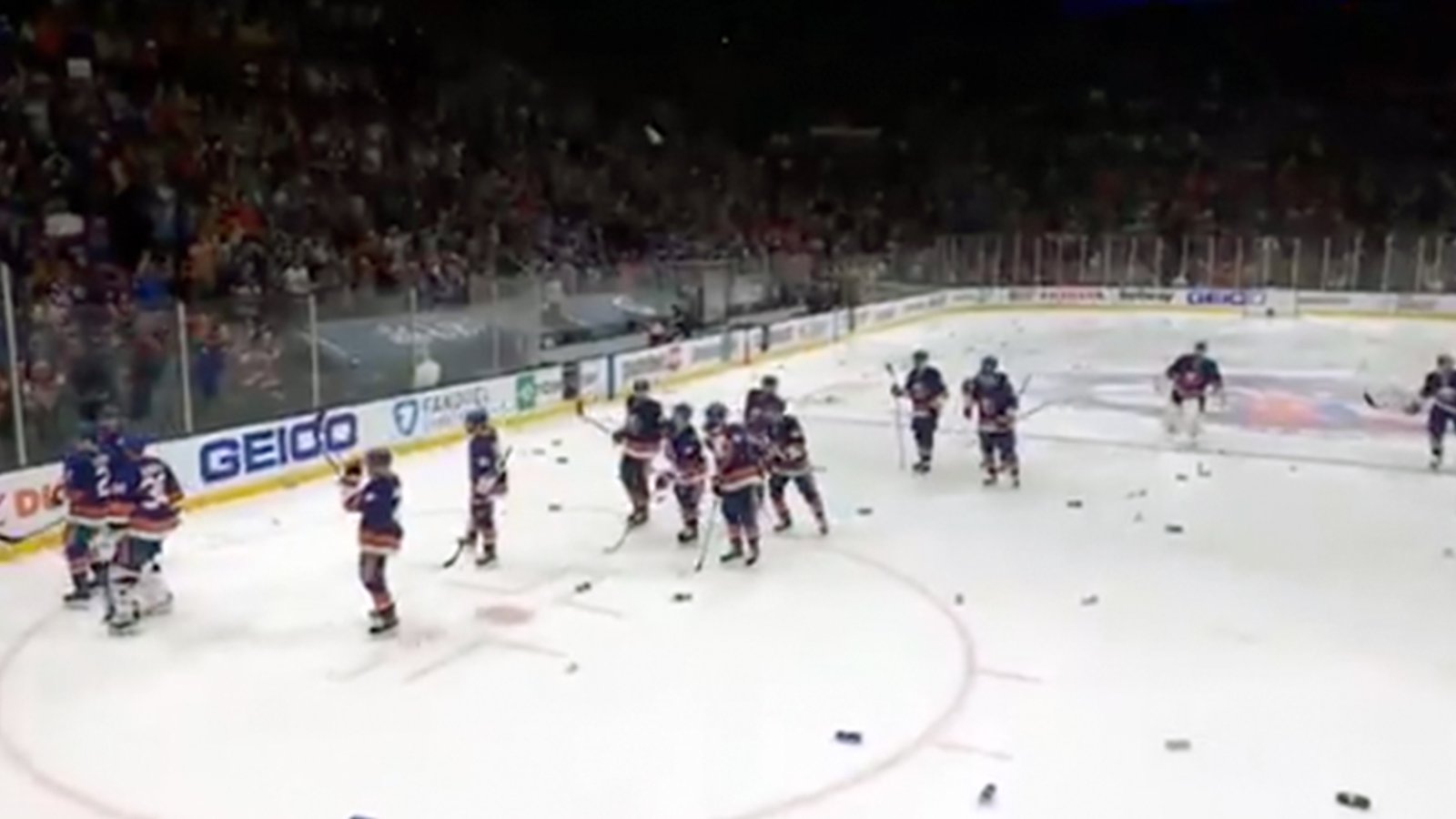 Islanders fans litter the ice with garbage following Game 6 victory